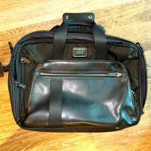 Tumi MOUNTAIN 2/1 briefcase and backpack.